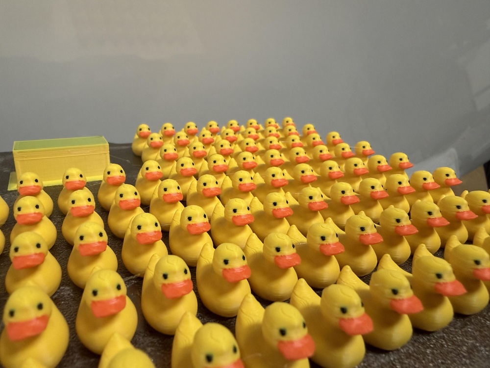 A small-batch run of mini 3D-printed ducks